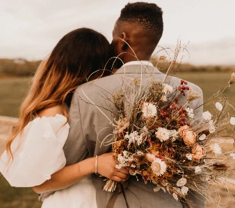 Couple Hugging at Wedding